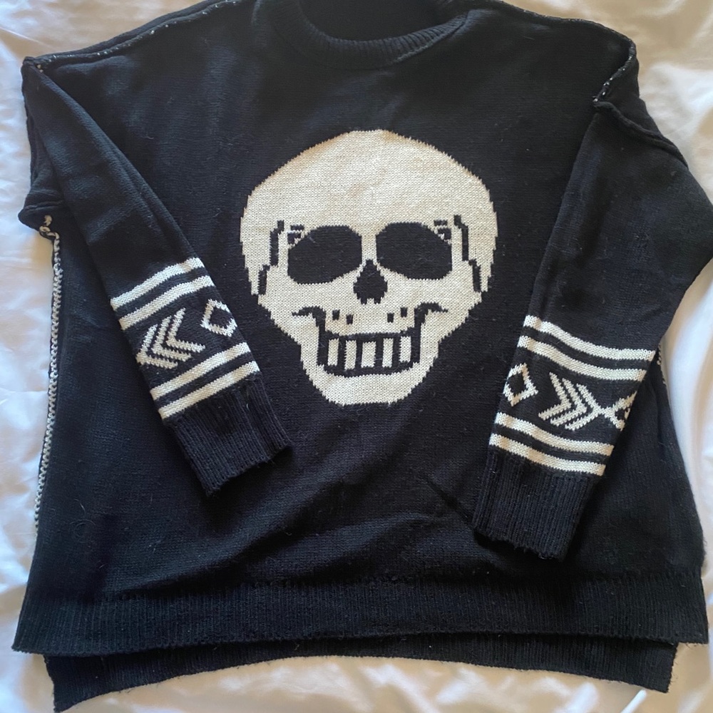 Reversible black + white skull sweater